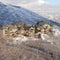 Square Winter in Utah with snowy Wasatch Mountains and lovely mountain homes views