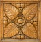 Square wood panel hand carved with flower and plant shapes