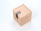 Square wooden box mockup with black sticker on white background