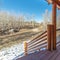 Square Wooden porch overlooking winter countryside day light