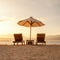 Squared image of two beautiful chairs and umbrella parasol on a paradise sandy beach