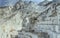 Squared slopes of white marble quarry, Carrara, Italy