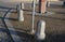 Squares and streets with mosaic tiled granite and white marble tiles separated by stone pillars stone pillars and a drinking fount