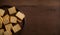 Squares of Wheat Crackers on Wooden Table with Copy Space