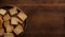 Squares of Wheat Crackers on Wooden Table with Copy Space