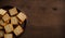 Squares of Wheat Crackers on Wooden Table with Copy Space