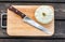 Squash on a cutting board wooden background with steel knif