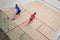 Squash players in action on a squash court