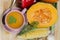 Squash soup and organic pumpkin fresh vegetables: corn, red pepp
