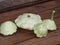 Squashes and patisons on a wooden terrace.