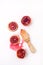 Squeezed Sliced Ripe Juicy Sicilian Blood Oranges on White Background Tasty Oranges Wooden Squeezer Vertical Top View