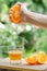 Squeezing fresh orange juice