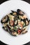 Squid ink pasta with mussels, shrimp and chiles