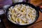 Squid pasta composition on a wooden background