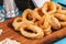 Squid rings fried in batter snack for beer with cream sauce and steamed rice