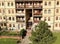 Sremska Mitrovica, Serbia, April 08, 2020 - disinfection of the entrance of an apartment building by two women - cleaning ladies