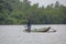 Sri Lankan river, srilankan tourism, Fisherman of lake in action when fishing on twilight, Srilankan culture and tourism.wooden