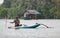 Sri Lankan river, srilankan tourism, Fisherman of lake in action when fishing on twilight, Srilankan culture and tourism.wooden