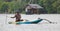 Sri Lankan river, srilankan tourism, Fisherman of lake in action when fishing on twilight, Srilankan culture and tourism.wooden