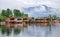 Srinagar, India - April 25, 2017 : Dal lake, People living in `House boat ` and using small boat `Shikara ` for