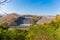 Srinakarin Dam the power station with large mountains and many trees at Kanchanaburi, Thailand. To generate electricit