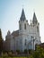 St. Anna Roman Catholic Church facade shine in sun dawn rays, backlit historic Christian temple