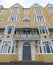 St Aubyns Mansions on Kings Esplanade, Hove, East Sussex, UK. Restored mustard coloured block of flats overlooking the sea
