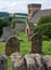 St Barnabas Anglican church, surrounded by a graveyard, in the picturesque English Cotswold village of Snowsill, Gloucestershire.