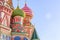 St Basil`s cathedral on Red Square in Moscow. Domes the cathedral against blue sky. Copy space