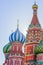 St Basil`s cathedral on Red Square in Moscow. Domes the cathedral lit by the sun.