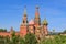 St. Basil`s Cathedral and towers of Moscow Kremlin on a sunny summer morning