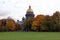 St. Isaac Cathedral, north-west elevation, view across Aleksandrovskiy Garden in autumn foliage, St. Petersburg, Russia