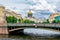 St. Isaac`s Cathedral dome and Bridge of kisses over Moyka river, Saint Petersburg, Russia