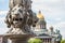 St. Isaac& x27;s Cathedral out of focus, in the foreground the sculpture of lions on a pole, Saint-Petersburg, Russia.