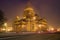 St. Isaac`s Cathedral in the urban landscape of the misty night. March in Saint Petersburg