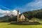 St. John church in front of the Odle mountains, Funes Valley, Dolomites, Italy