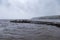 The St. Lawrence River experiences increasingly high tides each spring during the full moon period, reaching a wooden platform in