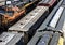 St. Louis, Missouri, United States-circa 2018-multiple lines of train cars lined up on train tracks in trainyard, covered hoppers,