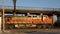 St. Louis, Missouri, USA, October 2020 - BNSF train locomotive running on railroad tracks in city