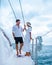 St Lucia, couple men and woman watching sunset from sailing boat in the Caribbean sea near Saint Lucia or St Lucia