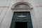 St Maria Sopra Minerva Basilica entrance with open doors and antique fresco