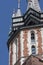 St. Mary`s Basilica Church of Our Lady Assumed into Heaven in Krakow / Cracow, Poland. Trumpeter, bugler playing an hourly bugl