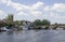 St Mary\\\'s Church of England tower overlooking the Thames with its boats and barge