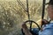 St. Mary`s, Missouri, USA, September 15, 2020 - Farmer driving harvester combine in farm corn field