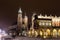 St. Marys Basilica at night, with night lamp visible and dramatic lights. Krakow, Poland