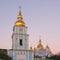 St. Michaels Golden-Domed Monastery with cathedral and bell tower during twilight in Kiev