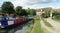 St Neots River Mill and Marina with moored narrow boats.