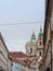 St Nicholas Church, also called Kostel Svateho Mikulase, in Prague, Czech Republic, with its iconic dome seen from nearby streets