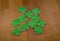 St. patratrika delicious cookies bright clover on a wooden table background