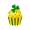 St Patrick cupcake with shamrock isolated on white background.